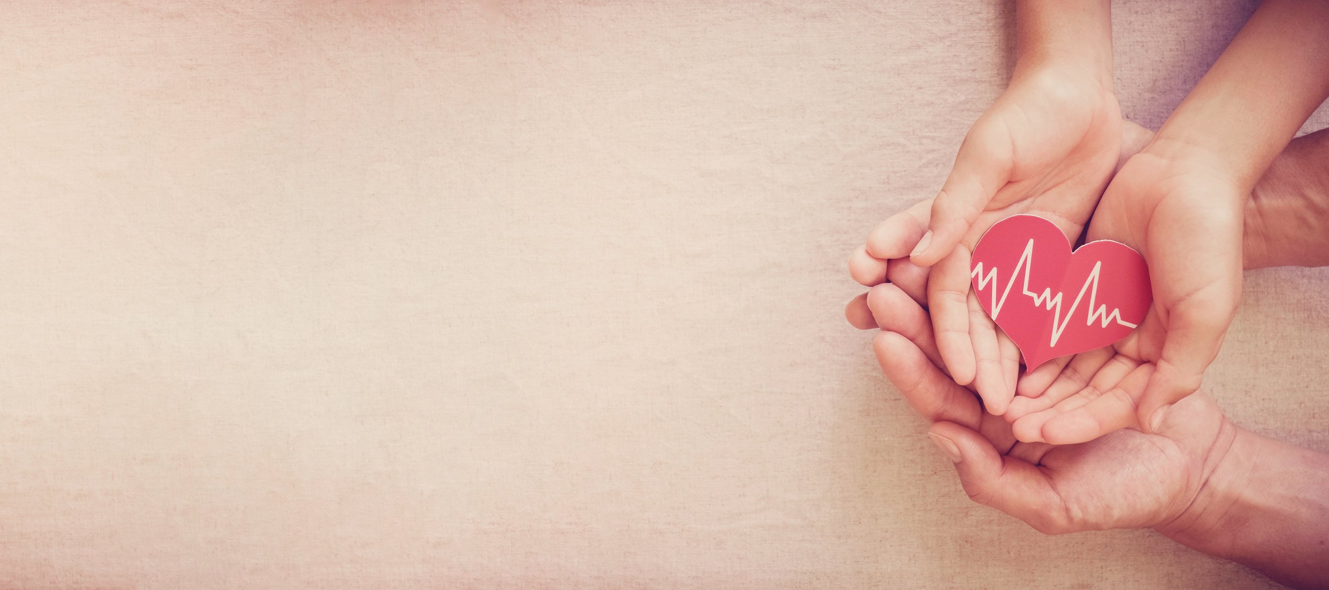 hands holding red heart with cardiogram, health care, life insurance business concept, world heart day, world health day